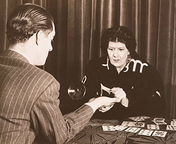 Fortune Teller Playing a Game of Cards